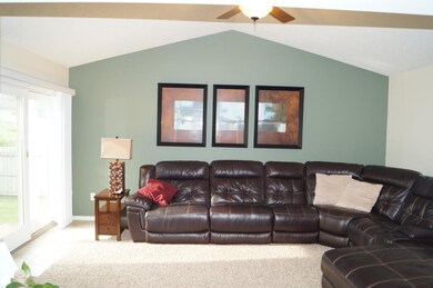 Main floor family room with vaulted ceiling
