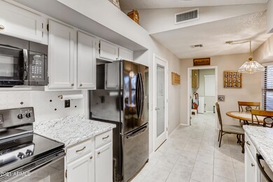 14027 W Aleppo Dr, Sun City West, AZ 85375 - photo 7