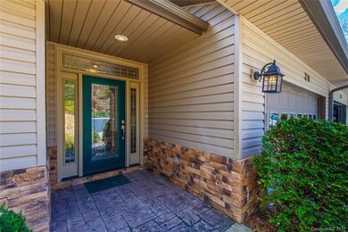 Stamped, concrete Entry accented with stone. Bevel