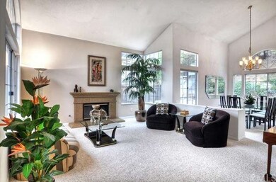 Spacious and inviting living room with high ceilin