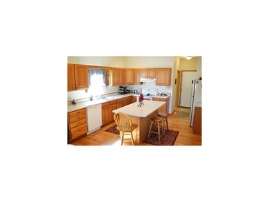 Kitchen. Lots of cabinet and counter space, hardwo