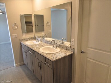Granite tops with tall vanities. Finishes are repr