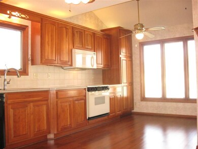 Kitchen eating space in front of windows