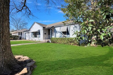 View of front of house with a front lawn