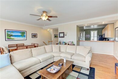 LR/DR WITH STAIRS TO BASEMENT AND GARAGE
