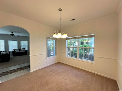 Unfurnished dining area featuring tile patterned f