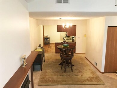 Open floorplan view from living room to kitchen.