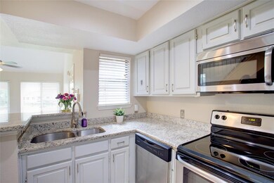 Granite countertops, tile backsplash and lots of l