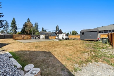 View from Lot A towards Lot C, the line between lot A & C is approximately just past the tip of the shadow in this photo & does cross into concrete pad where double gate is, so the gate will need to be adjusted if someone doesn't buy Lot A w/lot C