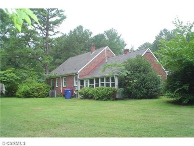 View - Side shot of back yard and house