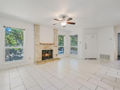 Unfurnished living room with plenty of natural li