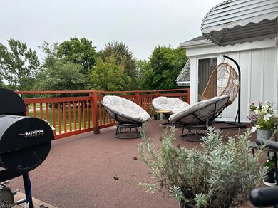 Wooden terrace with a patio area