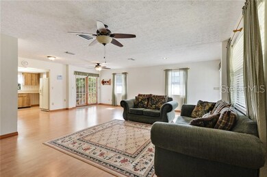 Living room with view of kitchen
