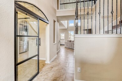 Step inside and be captivated! The spacious entryw