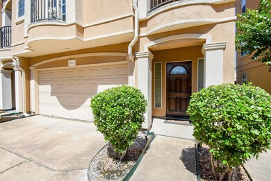 This photo showcases  a welcoming wooden front doo
