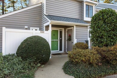 View of exterior entry with fence courtyard storag