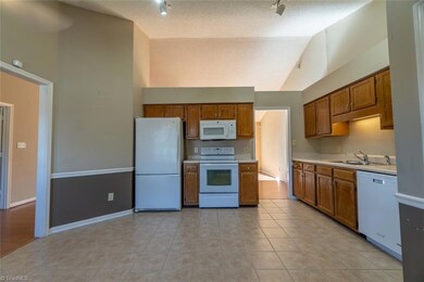 Kitchen with easy access to the living room.