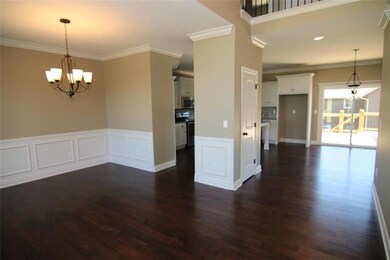 1709 Knoll Creek Ln, Raymore, MO 64083 - photo 2