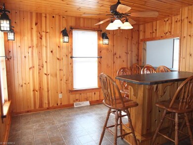 Dining room with built-in custom bar.