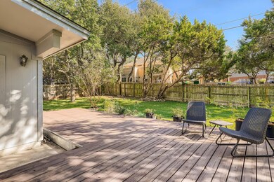 Deck featuring a fenced backyard