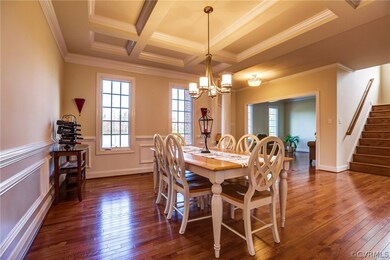 Formal dining room opens to the foyer.