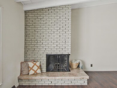 floor to ceiling brick fireplace