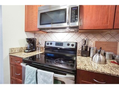 Kitchen with stainless steel appliances, light st
