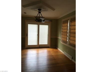 Large dining room with beautiful hardwood floors a