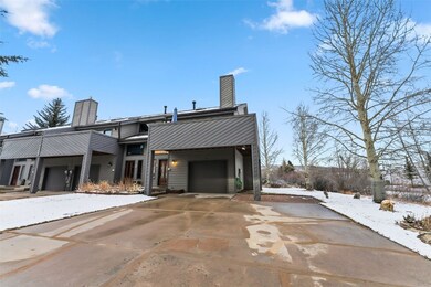 Plenty of parking outside of the one car garage.