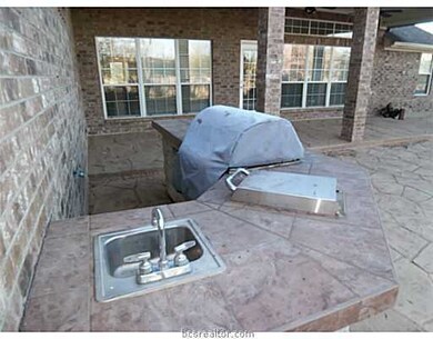 Patio/Deck. Enjoy back yard bbq s in the outdoor kitchen in this amazing backyard!