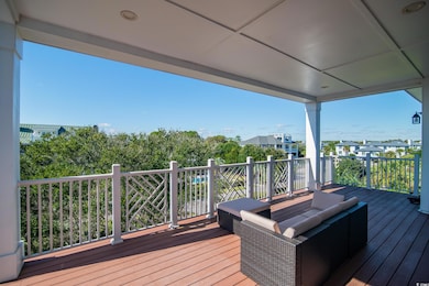 Wooden terrace with a residential view and an outdoor hangout area