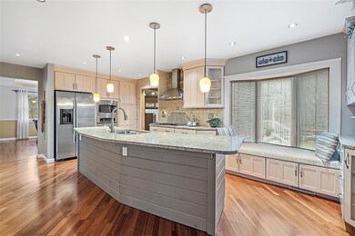 Large Chefs kitchen- equipped with stainless appli