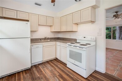 Kitchen with luxury vinyl plank flooring.