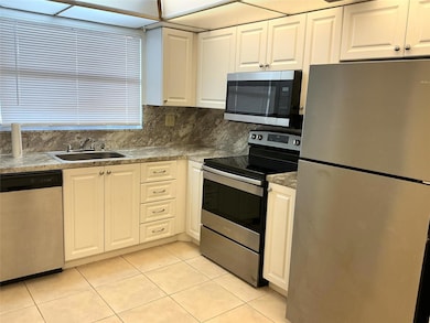 9481 Sunrise Lakes Blvd unit 102, Sunrise, FL 33322 - photo 3