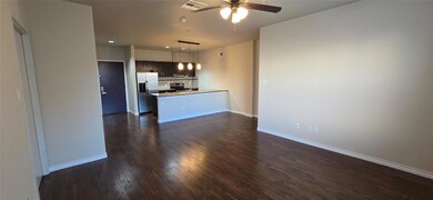 Kitchen featuring dark hardwood / wood-style floor