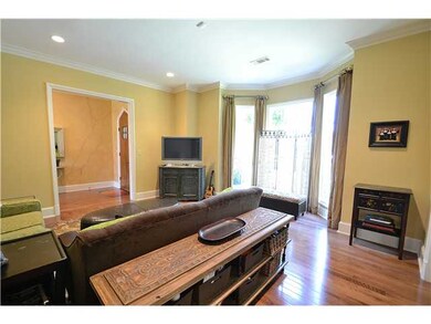 The front living room is spacious and casual, with