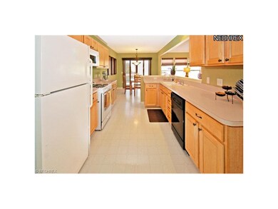 The Eat in kitchen expands the length of the home,