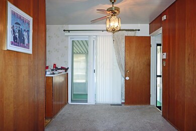 Dining Rm w/Patio door to Sun Room
