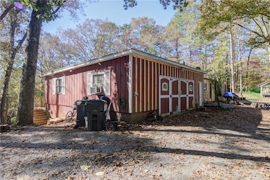View of outbuilding with cooling unit