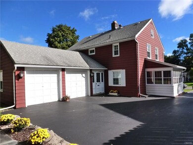 Side entrance and garages