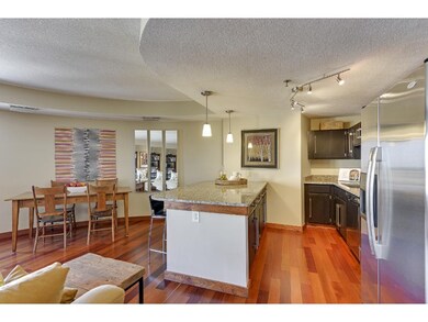 The kitchen peninsula houses additional under-coun