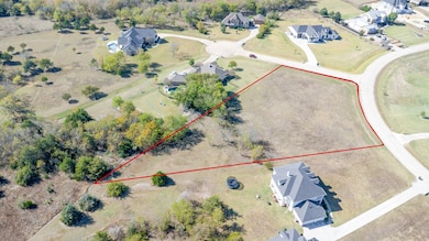 Aerial view of property's location featuring property parcel outlined