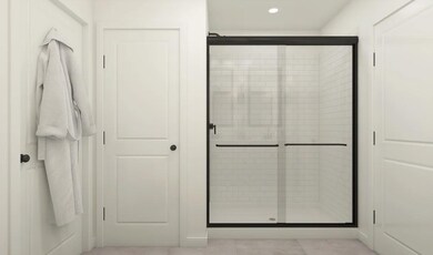 Primary bath with glass shower enclosure