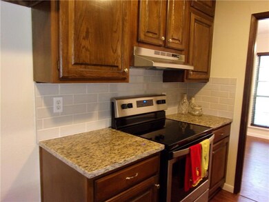 New 3 cm Granite counters, subway tile backsplash,