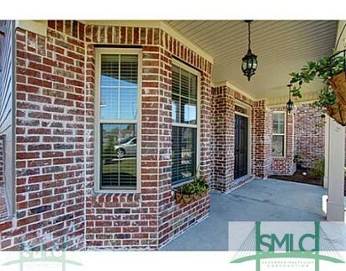 Exterior Front. Large, covered porch is perfect fo
