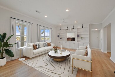 This spacious living room with beautiful windows,
