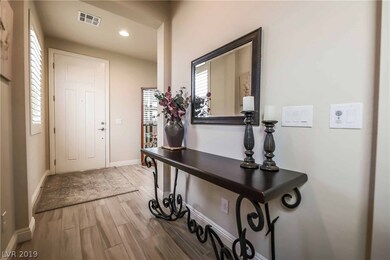 Features formal entry - stunning 'wood' plank tile