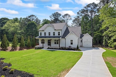 Modern farmhouse featuring board and batten siding