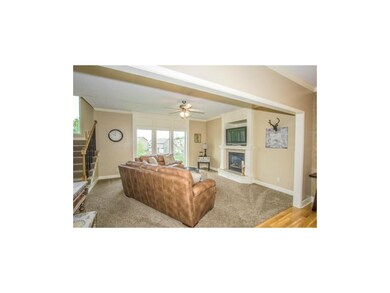 Great Room with New Carpet and Built In Entertainm