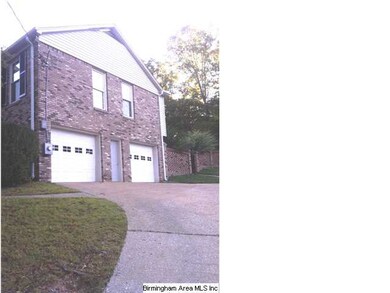 full brick with a two car garage